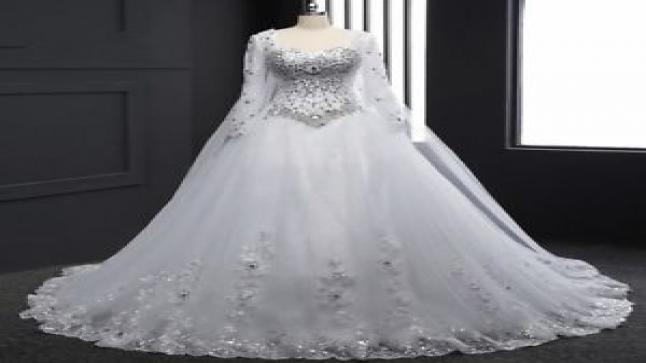 تفسير حلم الفستان الأبيض في المنام للعزباء والمتزوجة والحامل